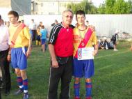 Sergiu Sava felicitata de antrenorul de futsal profesorul Petrache Gurguiatu...