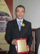 Alin Moldoveanu si placheta Honoris Causa Unirist ...